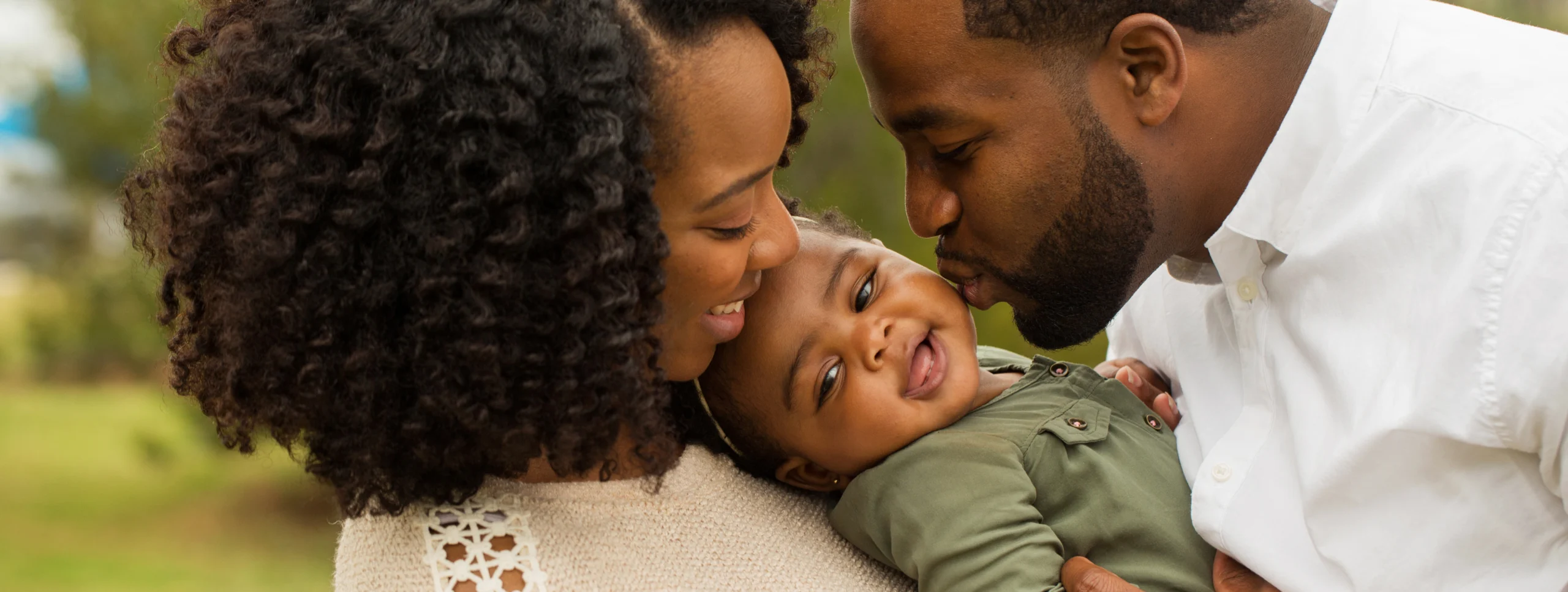 Happy family representing the FIGCM community